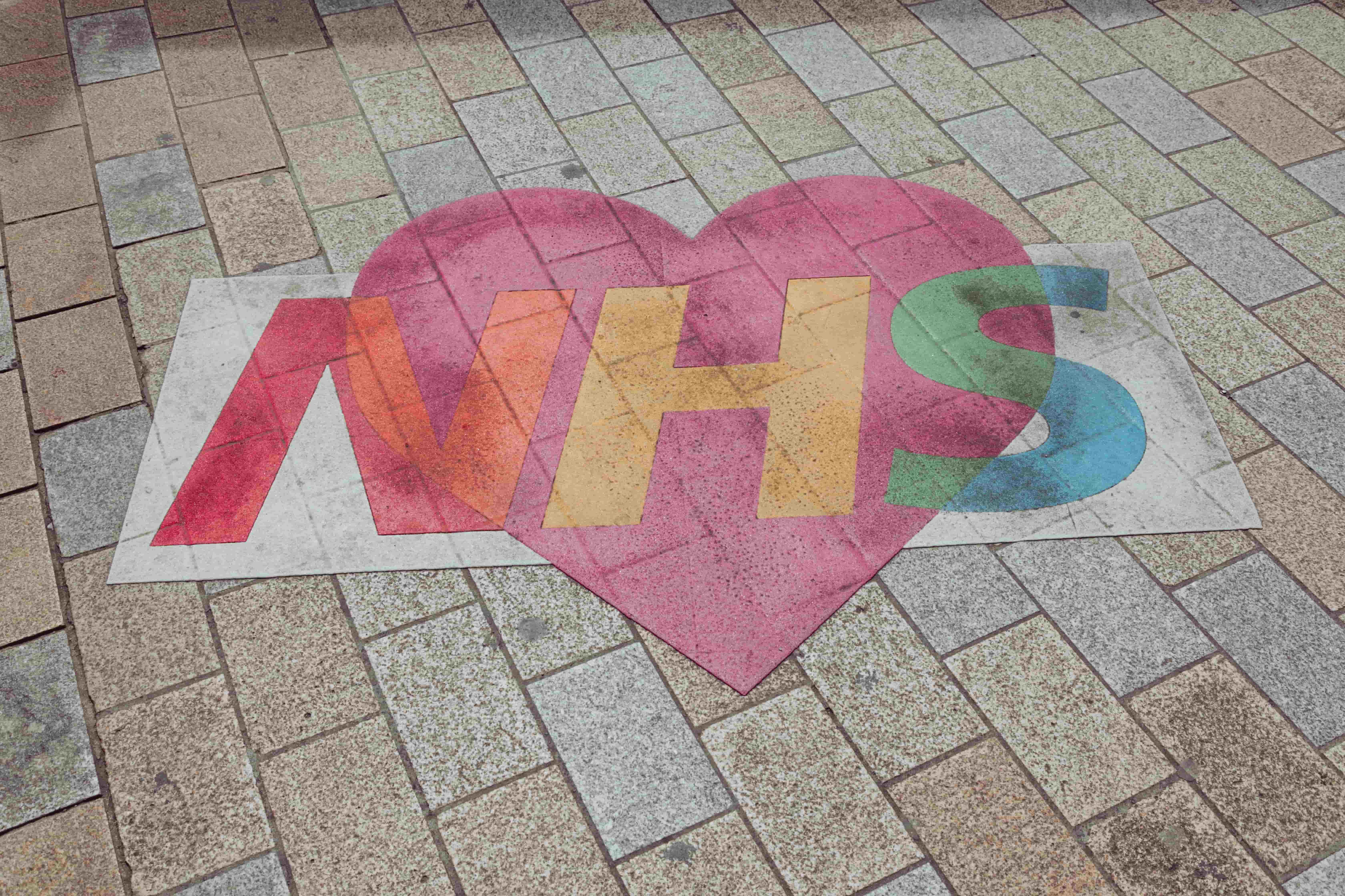 NHS sign with a heart